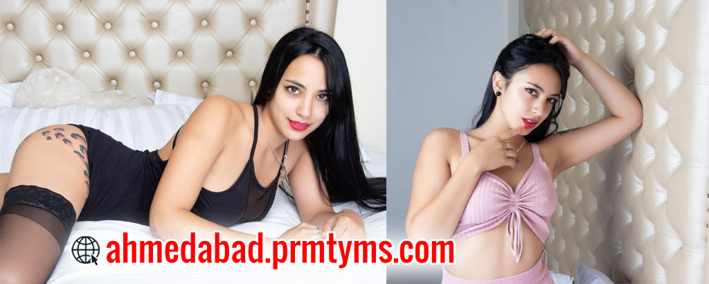 The attractive young woman is promoting escort services in Ahmedabad by posing in black and pink outfits on a bed.